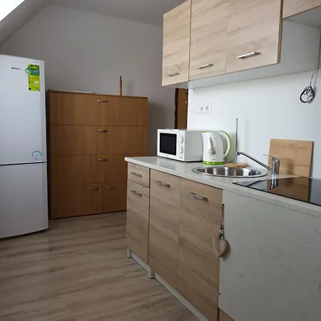 Que Apartment *